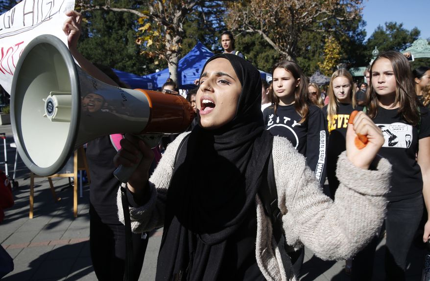 Thousands of high school and college students march to Sproul Plaza on the University of California, Berkeley campus to protest the presidential election of Donald Trump on Wednesday, Nov. 9, 2016, in Berkeley, Calif. (Paul Chinn/San Francisco Chronicle via AP)