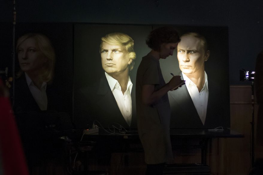 Portraits of President-elect Donald Trump and Russian President Vladimir Putin hang in the Union Jack pub in Moscow. (Associated Press/File)