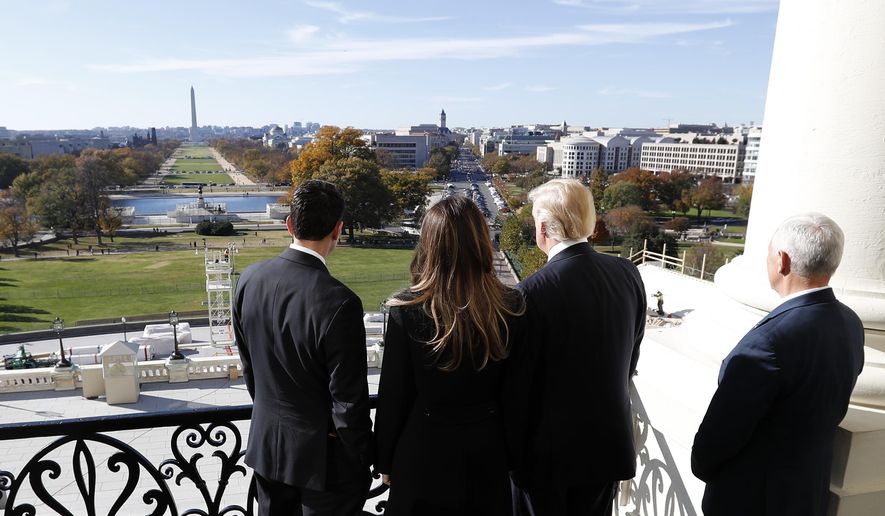 House Speaker Paul Ryan of Wis., left, shows President-elect Donald Trump, his wife Melania and Vice president-elect Mike Pence the view of the inaugural stand that is being built and Pennsylvania Avenue, from the Speaker&#39;s Balcony on Capitol Hill in Washington, Thursday, Nov. 10, 2016. (AP Photo/Alex Brandon)