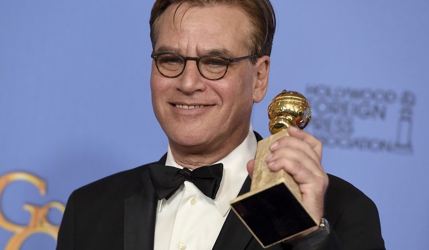 FILE - In this Jan. 10, 2016, file photo, Aaron Sorkin poses in the press room with the award for best screenplay - motion picture for &amp;quot;Steve Jobs&amp;quot; at the 73rd annual Golden Globe Awards at the Beverly Hilton Hotel in Beverly Hills, Calif. President-elect Donald Trump&#39;s victory prompted Sorkin to write a letter to his wife and daughter that was published online by Vanity Fair Nov. 9, 2016. (Photo by Jordan Strauss/Invision/AP, File)