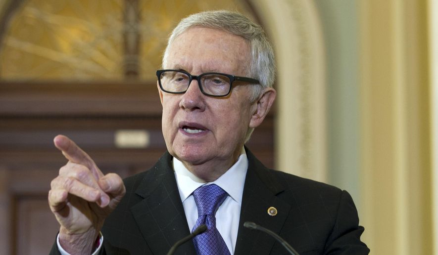 In this Sept. 14, 2106, file photo, then-Senate Minority Leader Harry Reid of Nev. speaks on Capitol Hill in Washington. Reid, the departing Senate Minority Leader, lashed out at Donald Trump on Friday, Nov. 11, 2016, as “a sexual predator who lost the popular vote and fueled his campaign with bigotry and hate.”  (AP Photo/Jose Luis Magana, File)