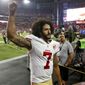 San Francisco 49ers quarterback Colin Kaepernick (7) makes a fist as he is booed by fans after an NFL football game against the Arizona Cardinals, Sunday, Nov. 13, 2016, in Glendale, Ariz. The Cardinals won 23-20. (AP Photo/Ross D. Franklin)