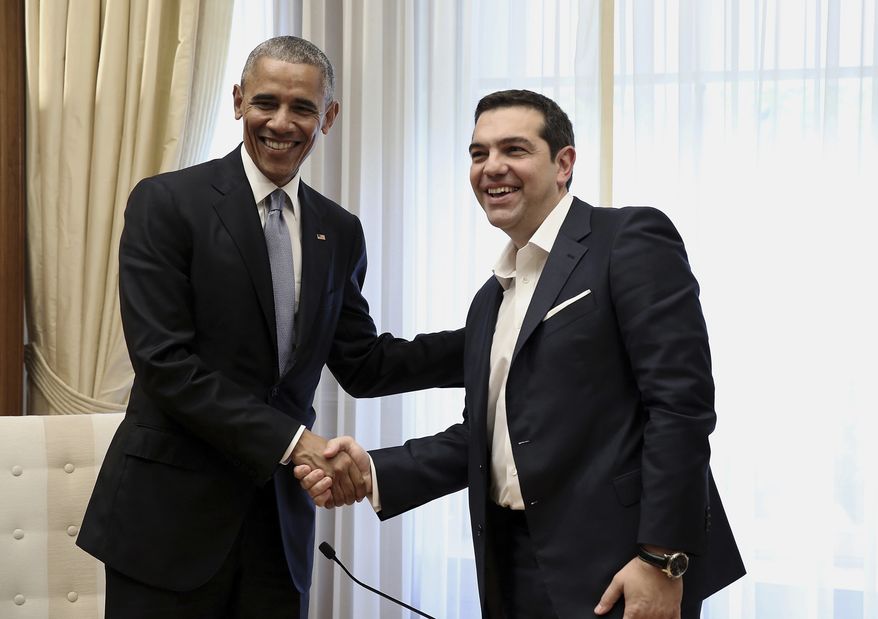 U.S. President Barack Obama, left, shake hands with Greek Prime Minister Alexis Tsipras during their meeting at Maximos Mansion in Athens on Tuesday, Nov. 15, 2016. Obama is opening his final foreign trip as president with reassuring words about the U.S. commitment to NATO even as he prepares to hand off to a Donald Trump administration. (Simela Pantzartzi/Pool Photo via EPA)