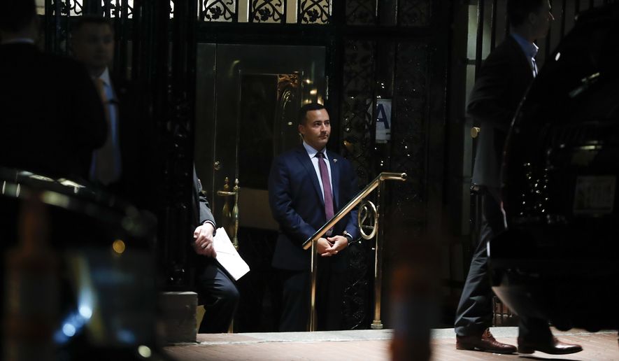 Security personnel stand at entrance of 21 Club Restaurant, Tuesday, Nov. 15, 2016, in New York, where President-elect Donald Trump is having dinner. (AP Photo/Carolyn Kaster)