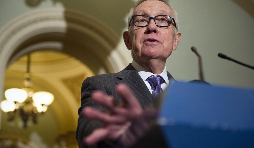 Outgoing Senate Democratic leader Harry Reid of Nev., speaks with reporters along with Nevada's newly elected Congressional Democrats on Capitol Hill in Washington, Monday, Nov. 14, 2016. (AP Photo/Cliff Owen)