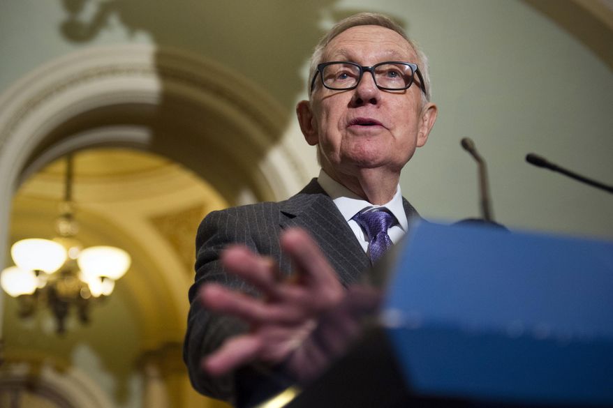 Outgoing Senate Democratic leader Harry Reid of Nev., speaks with reporters along with Nevada's newly elected Congressional Democrats on Capitol Hill in Washington, Monday, Nov. 14, 2016. (AP Photo/Cliff Owen)