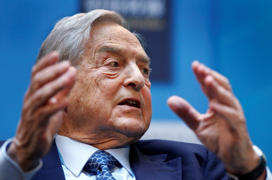 George Soros, chairman of Soros Fund Management, speaks during a forum &quot;Charting A New Growth Path for the Euro Zone&quot; at the IMF/World Bank annual meetings in Washington, Saturday, Sept. 24, 2011. (Associated Press) ** FILE **