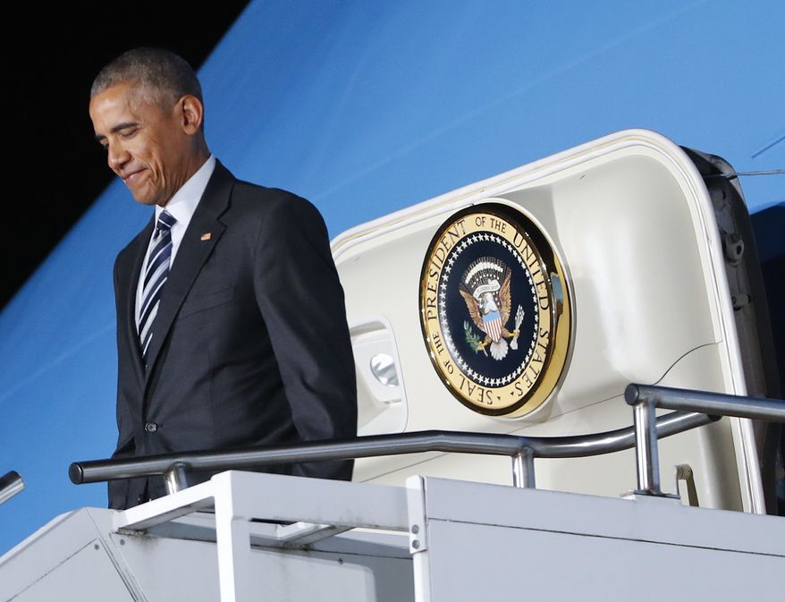 President Barack Obama steps off Air Force One upon his arrival to Tegel International Airport in Berlin, Wednesday, Nov. 16, 2016. (AP Photo/Pablo Martinez Monsivais) ** FILE **