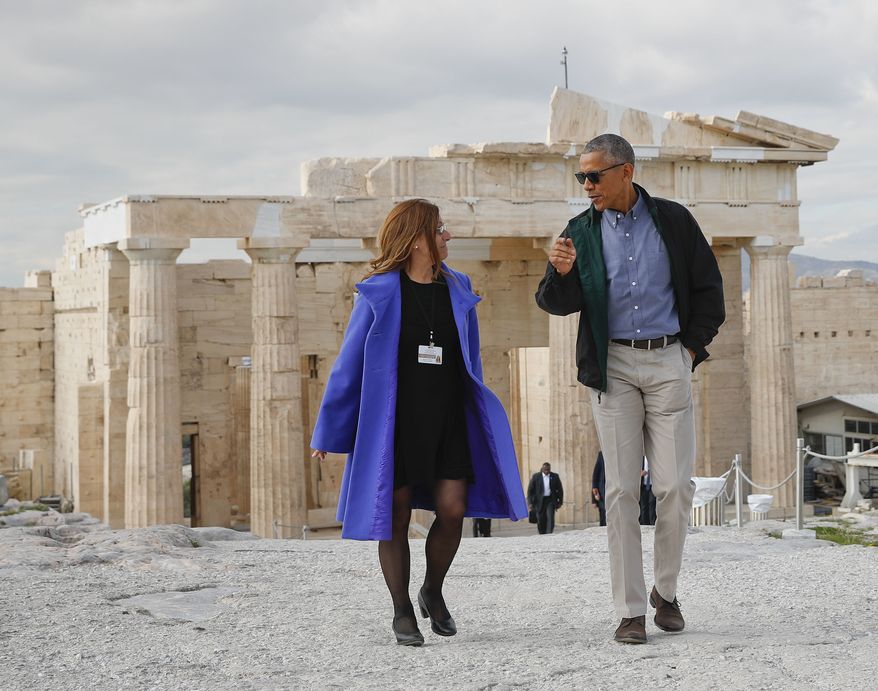 U.S. President Barack Obama tours Acropolis with Dr. Eleni Banou, left, director of Ephorate of Antiquities for Athens, Ministry of Culture, Wednesday, Nov. 16, 2016 in Athens. (AP Photo/Pablo Martinez Monsivais)