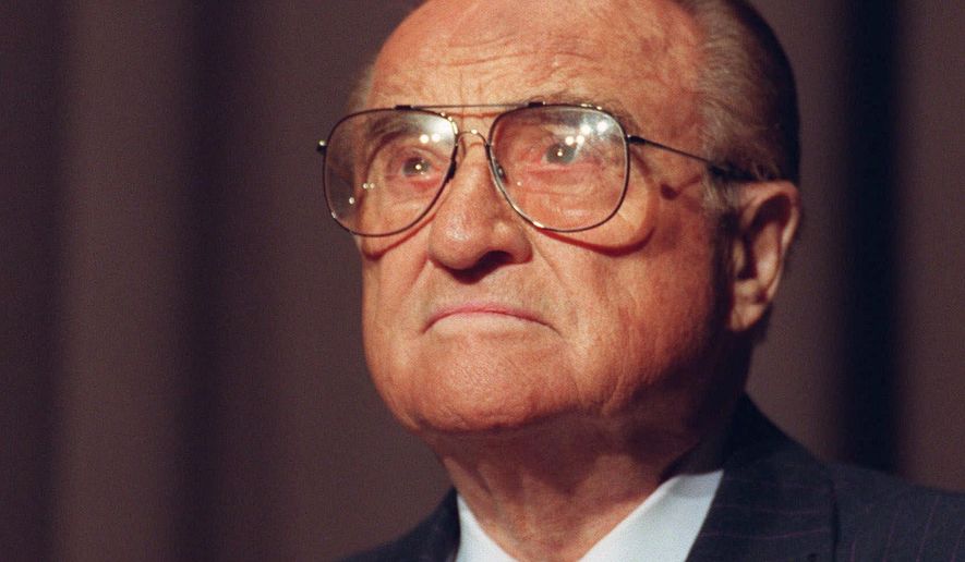 FILE - In this Oct. 22, 1998 file photo, Archer Daniels Midland Chairman Dwayne Andreas addresses the annual shareholders meeting in Decatur, Ill. A company spokesperson confirmed Wednesday, Nov. 16, 2016, that Andreas has died. He was 98. The company did not immediately provide additional details on a cause of death or where he died. (Dennis Magee/Herald & Review via AP, File)