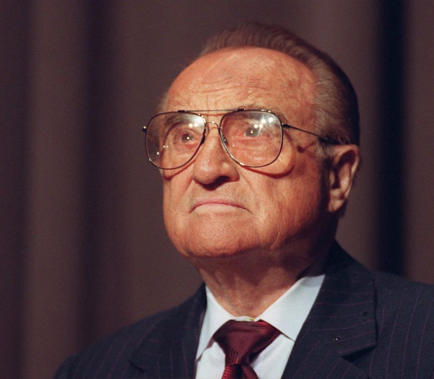FILE - In this Oct. 22, 1998 file photo, Archer Daniels Midland Chairman Dwayne Andreas addresses the annual shareholders meeting in Decatur, Ill. A company spokesperson confirmed Wednesday, Nov. 16, 2016, that Andreas has died. He was 98. The company did not immediately provide additional details on a cause of death or where he died. (Dennis Magee/Herald & Review via AP, File)