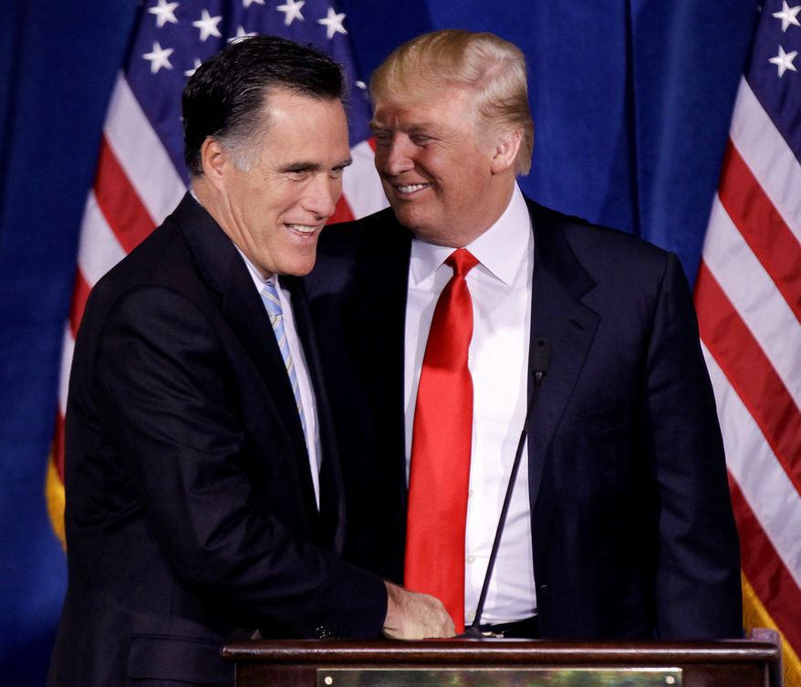 In this Feb. 2, 2012 file photo, Donald Trump greets Republican presidential candidate, former Massachusetts Gov. Mitt Romney during a news conference in Las Vegas. Mr. Romney will meet with President-elect Donald Trump on Nov. 19, 2016, as Mr. Trump continues meetings with prospective Cabinet members and works on his transition to the White House. (AP Photo/Julie Jacobson, File) **FILE**