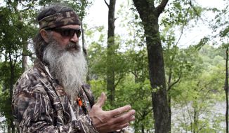 Phil Robertson, the family patriarch the Robertsons of the television series, poses for a photograph at his home in western Ouachita Parish in Monroe, La, May 15, 2013. (Margaret Croft/The News-Star via AP) ** FILE **