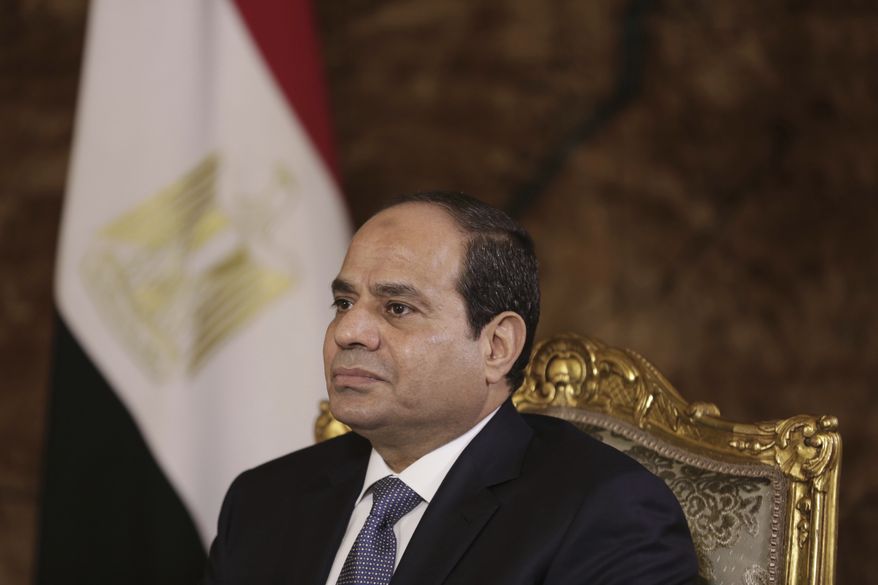 FILE - In this Sept. 20, 2014 file photo, Egyptian President Abdel-Fattah el-Sissi listens during an interview with The Associated Press at the presidential palace in Cairo. Egypt&#39;s President Abdel-Fattah el-Sissi is praising U.S. President-elect Donald J. Trump saying Trump&#39;s words as a presidential candidate will be different from his actions as a president. (AP Photo/Maya Alleruzzo, File)