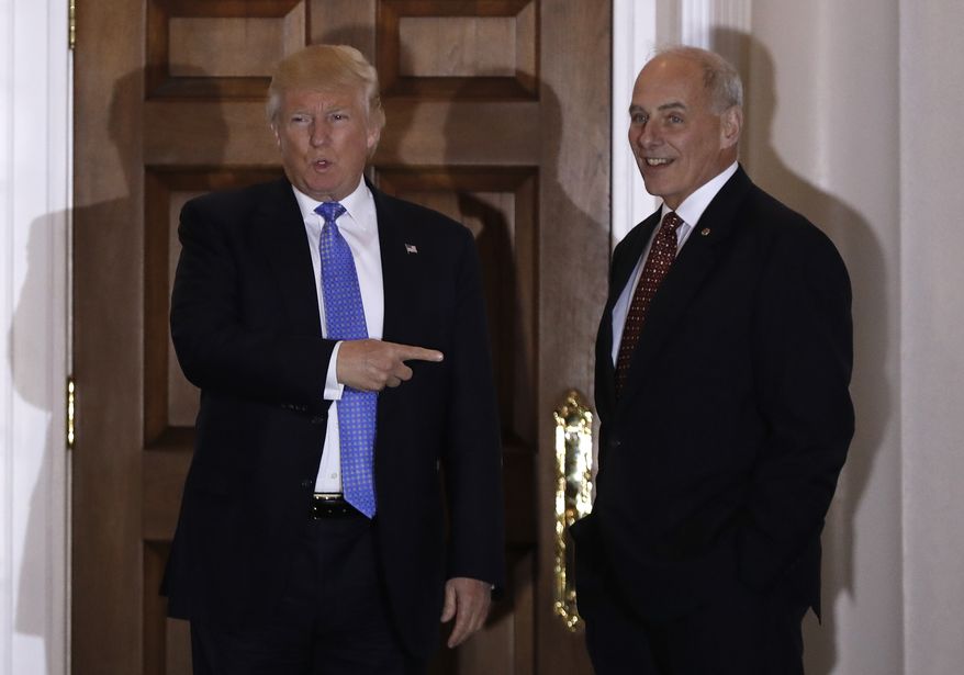 President-elect Donald Trump talks to media as he stands with retired Marine Gen. John Kelly, right, at the Trump National Golf Club Bedminster clubhouse Sunday, Nov. 20, 2016, in Bedminster, N.J.. (AP Photo/Carolyn Kaster)