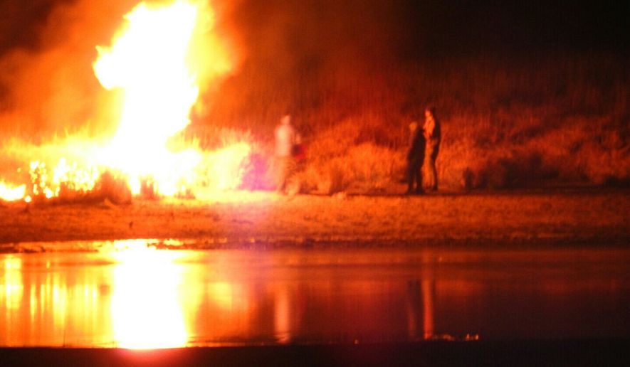 In this image provided by Morton County Sheriff’s Department, law enforcement and protesters clash near the site of the Dakota Access pipeline on Sunday, Nov. 20, 2016, in Cannon Ball, N.D. The clash came as protesters sought to push past a bridge on a state highway that had been blockaded since late October, according to the Morton County Sheriff&#39;s Office. (Morton County Sheriff’s Department via AP)