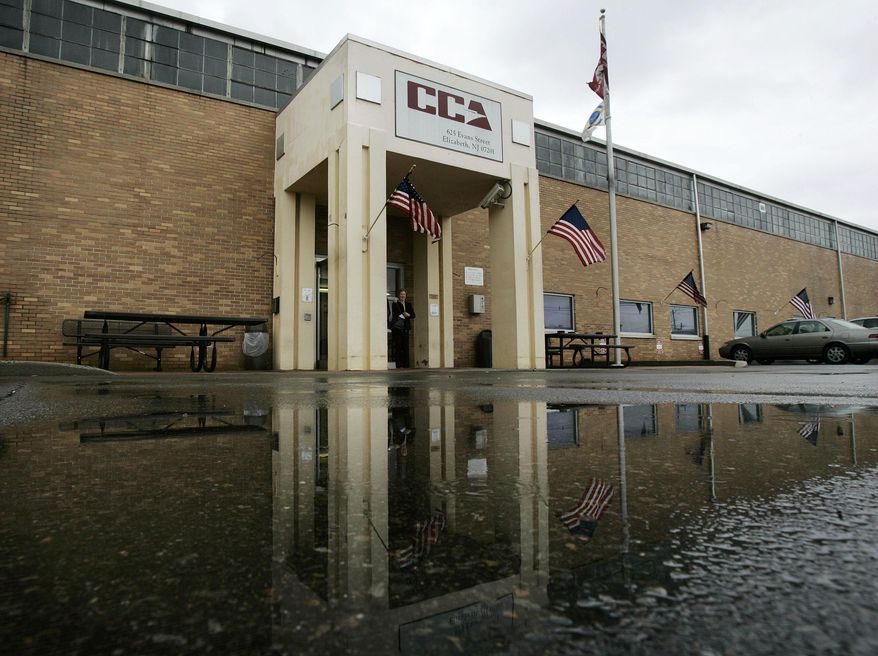 FILE - This Dec. 10, 2008 file photo shows the Corrections Corporation of America (CCA) detention center in Elizabeth, N.J., that the private prison contractor runs for the government. President-elect Donald Trump's promise to deport millions of immigrants in the country illegally and his selection of tough-on-crime Alabama Sen. Jeff Sessions as attorney general could mean big money for the private prison industry. Some analysts believe the prison population could jump under the Trump administration, and the stock market seems to agree. A day after the Nov. 8, 2016 election, CoreCivic Co., formerly Corrections Corporation of America, saw the biggest percentage gain on the New York Stock Exchange. (AP Photo/Mel Evans, File)