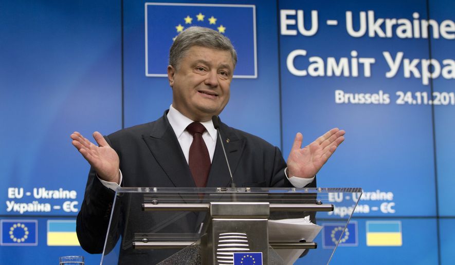 Ukrainian President Petro Poroshenko speaks during a media conference at the conclusion of an EU-Ukraine summit at the European Council building in Brussels on Thursday, Nov. 24, 2016. (AP Photo/Virginia Mayo)