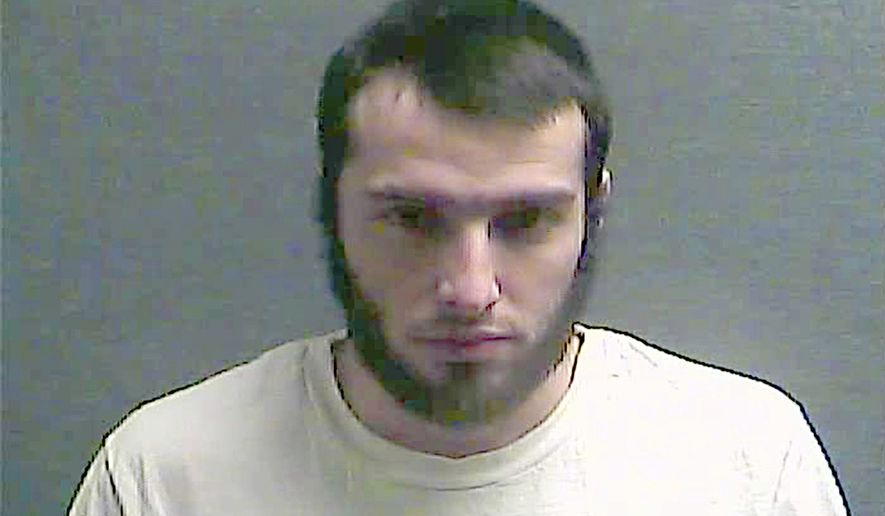 Christopher Lee Cornell of Green Township in suburban Cincinnati is shown in this July 29, 2016, file booking photo made available by the Boone County Jail in Burlington, Ky. Federal authorities say Cornell, who plotted to attack the U.S. Capitol during President Barack Obama&#39;s 2015 State of the Union address, kept trying from behind bars to incite others to violence in support of the Islamic State. (Boone County Jail via AP, File) ** FILE **