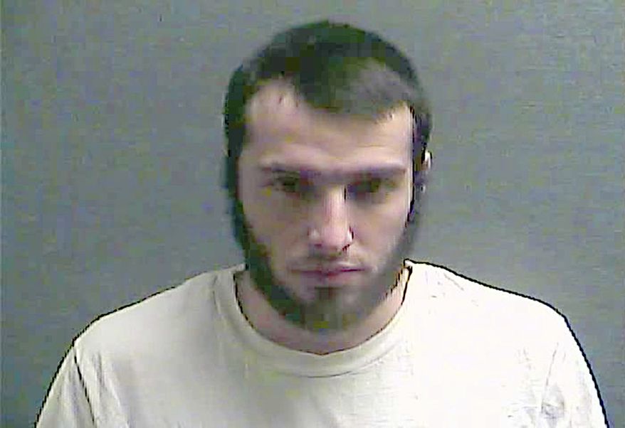 Christopher Lee Cornell of Green Township in suburban Cincinnati is shown in this July 29, 2016, file booking photo made available by the Boone County Jail in Burlington, Ky. Federal authorities say Cornell, who plotted to attack the U.S. Capitol during President Barack Obama's 2015 State of the Union address, kept trying from behind bars to incite others to violence in support of the Islamic State. (Boone County Jail via AP, File) ** FILE **