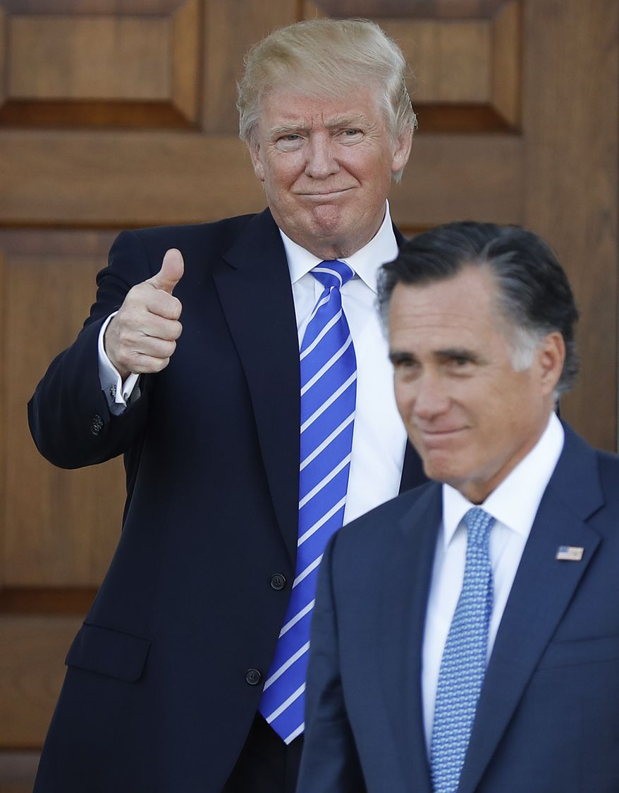 President-elect Donald Trump gives the thumbs-up as Mitt Romney leaves Trump National Golf Club Bedminster in Bedminster, N.J., Saturday, Nov. 19, 2016. (AP Photo/Carolyn Kaster)