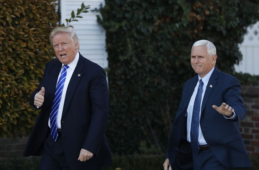 President-elect Donald Trump and Vice President-elect Mike Pence arrive at the Trump National Golf Club Bedminster clubhouse in Bedminster, N.J., Saturday, Nov. 19, 2016. (AP Photo/Carolyn Kaster)