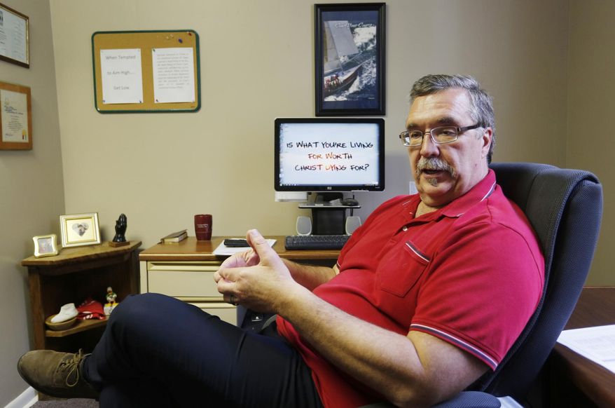 ADVANCE FOR WEEKEND EDITIONS, NOV. 24-26 - In this Sept. 14, 2015 photo, executive director Phil Gabriel talks about the men who come through the door for treatment at Trinity Life Ministry's rehab center in Crawfordsville, Ind. Gabriel said the center sees men from all different backgrounds and different ages. Most have criminal backgrounds and tough childhoods. "A lot of these young men in their early twenties come to the place in their life where they're at a point of life or death, and a lot of them know that if they don't get help it could be very much within the next 30 days that they would be dead and they recognized that." (John Terhune/Journal & Courier via AP)