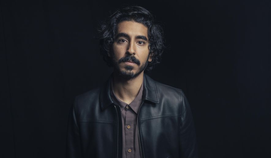 In this Nov. 17, 2016 photo, Dev Patel poses for a portrait to promote his film, "Lion," in New York. Patel portrays Saroo Brierley, an Indian man who was lost as a five-year-old, adopted and raised by Australian parents, and who, 25 years later, used Google Earth to find his way home, (Photo by Victoria Will/Invision/AP)