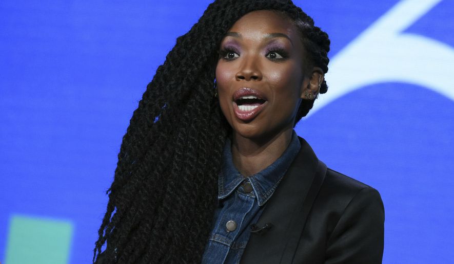 FILE - In this Jan. 6, 2016, file photo, recording artist and actress Brandy Norwood speaks during the "Zoe Ever After" panel at the Viacom 2016 Winter TCA in Pasadena, Calif. Brandy performed a medley of some of her biggest hits after receiving the "Lady of Soul" award at the Soul Train Awards on Nov. 27, 2016. (Photo by Richard Shotwell/Invision/AP, File)