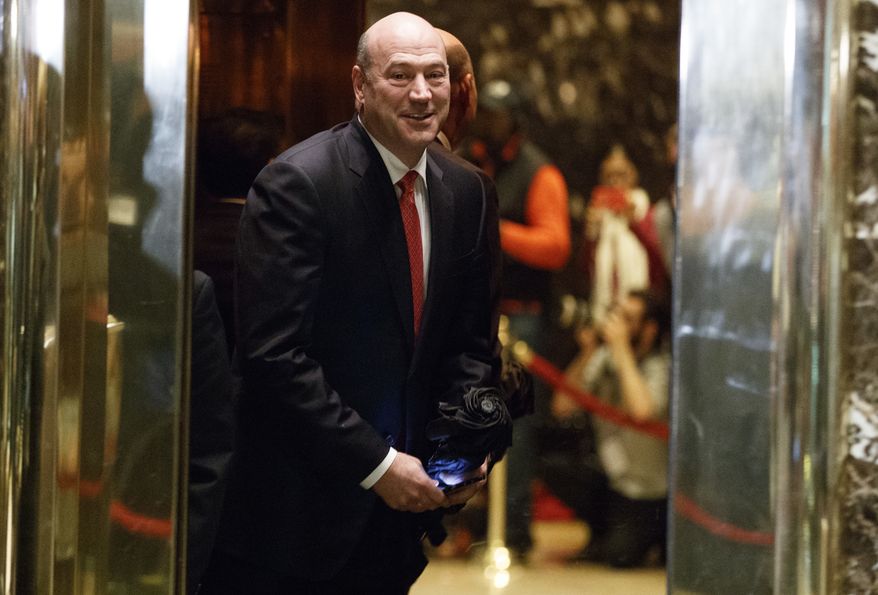 Goldman Sachs COO Gary Cohn gets on an elevator for a meeting with then-President-elect Donald Trump at Trump Tower, Tuesday, Nov. 29, 2016, in New York. (AP Photo/Evan Vucci) ** FILE **
