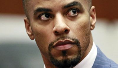 FILE - In this March 23, 2015, file photo, former NFL football player Darren Sharper appears in Los Angeles Superior Court. The former NFL star case reaches its conclusion Tuesday, Nov. 29, 2016, in the courthouse where he first admitted drugging and raping women in four states. The sentencing in Los Angeles Superior Court marks the end of prosecutions that unmasked the popular former all-pro safety and Super Bowl champ as a serial rapist. (AP Photo/Nick Ut, Pool, File)