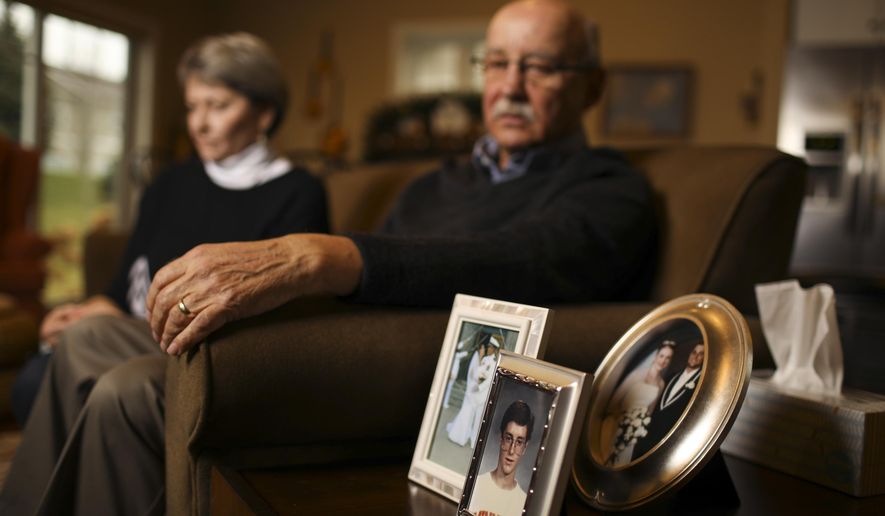 Loni and Jim Kerze talk about their son, Christopher, during an interview in their Woodbury, Minn., home Monday, Nov. 28, 2016. The resolution of the Jacob Wetterling case is pushing the Woodbury couple to try to find their son, who went missing 26 years ago. Unlike Wetterling, who was abducted and killed, Christopher Kerze is believed to have run away. But the only piece of evidence authorities have found is his abandoned van. (Jeff Wheeler/Star Tribune via AP)