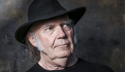 In this May 18, 2016, file photo, Neil Young poses for a portrait in Calabasas, Calif., to promote his new album, &quot;Earth.&quot; (Photo by Rich Fury/Invision/AP, File)