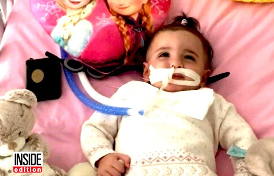 Marwa Bouchenafa, 1, from Marseilles, France, was placed in a medically induced coma after coming down with a virus. She came out of the coma as a medical team was preparing to take her off life support in September. (Inside Edition screenshot)