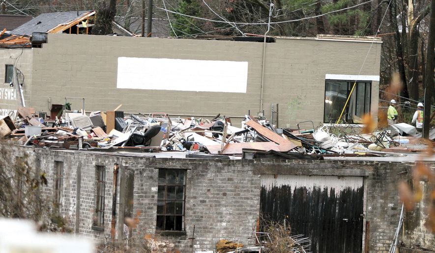 A tornado tore though Athens, Tenn., Wednesday, Nov. 30, 2016, leaving many people homeless causing damage to homes and businesses. (Tom Sherlin/The Daily Times via AP)