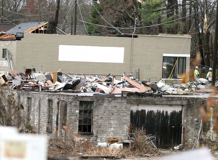 A tornado tore though Athens, Tenn., Wednesday, Nov. 30, 2016, leaving many people homeless causing damage to homes and businesses. (Tom Sherlin/The Daily Times via AP)