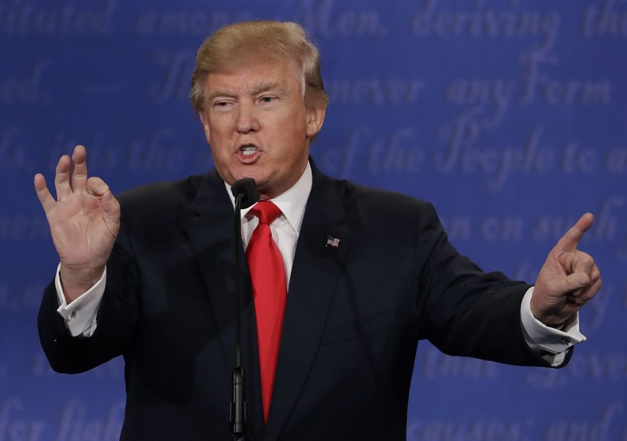 In this Oct. 19, 2016, file photo, Republican presidential nominee Donald Trump speaks during the third presidential debate with Democratic presidential nominee Hillary Clinton at UNLV in Las Vegas. (AP Photo/David Goldman, File)