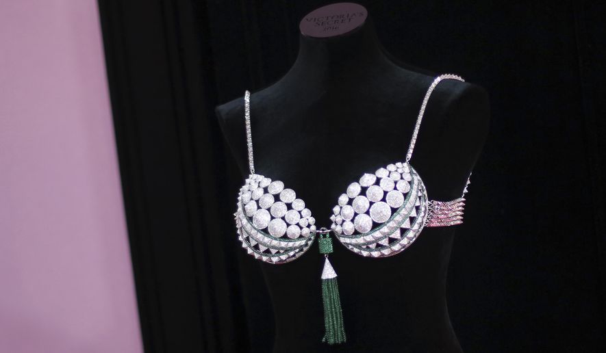 The $3 million Fantasy Bra is displayed before the Victoria's Secret fashion show in Paris, France, Wednesday, Nov. 30, 2016. The pulse-quickening, celebrity-filled catwalk event of the year: the Victoria's Secret fashion show takes place in Paris with performances from Lady Gaga and Bruno Mars. (AP Photo/Thibault Camus)