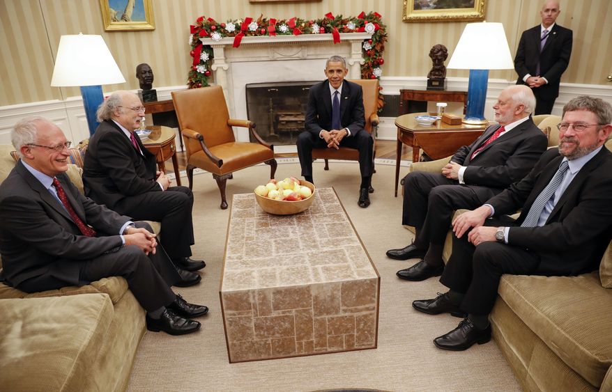President Barack Obama with the 2016 American Nobel Prize winners in the Oval Office of the White House in Washington, Wednesday, Nov. 30, 2016. With Obama are from left, Oliver Hart, Laureate of the 2016 Nobel Prize in Economic Sciences, from Harvard University, F. Duncan M. Haldane, Laureate of the 2016 Nobel Prize in Physics from Princeton University, Sir J. Fraser Stoddart, Laureate of the 2016 Nobel Prize in Chemistry from Northwestern University, and J. Michael Kosterlitz, Laureate of the 2016 Nobel Prize in Physics, from Brown University. (AP Photo/Pablo Martinez Monsivais)