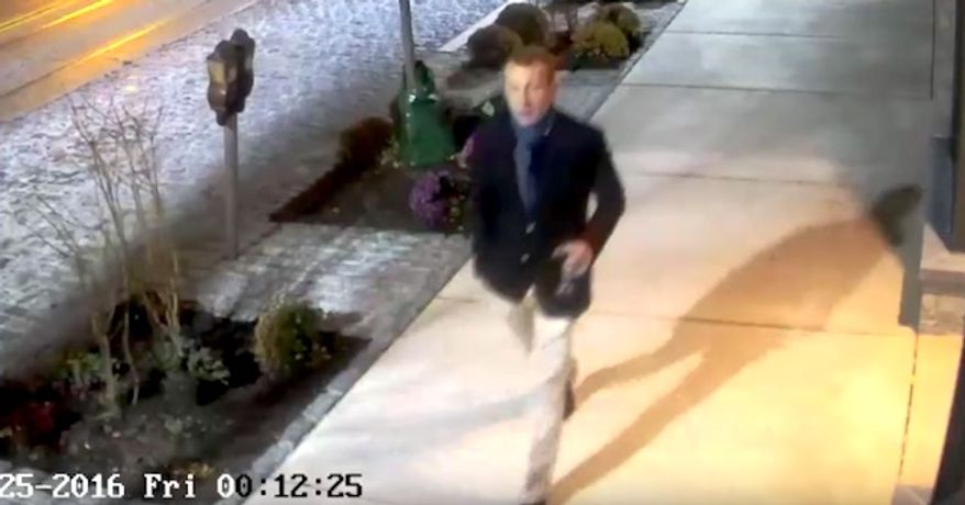 The Philadelphia Police Department released video footage on Tuesday Nov. 29, 2016, of two men connected with vandalizing a Fresh Market grocery store with anti-Trump graffiti. City officials say Duncan Lloyd, an assistant city solicitor caught on surveillance cameras during the crime, has contacted police. (YouTube, Philadelphia Police Department.)