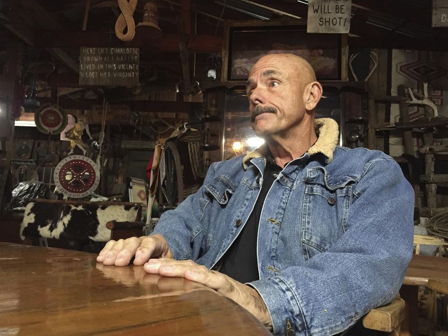 In this Wednesday, Nov. 30, 2016 photo, Wendell Phillips, talks at his home in Malibu, Calif. Phillips, a neighbor of a Malibu ranch where mountain lion, called P-45, is believed responsible for killing 10 alpacas over the weekend, says he will kill the animal if it comes back to the area. (AP Photo/Amanda Lee Myers)