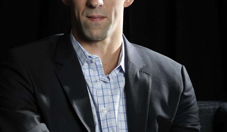 In this Tuesday, Oct. 25, 2016, photo, former Olympic swimmer Michael Phelps poses for a portrait while attending the Quickbooks Connect conference as a featured speaker in San Jose, Calif. Phelps is looking for his next golden opportunity in business after retiring from his sport as the most decorated athlete in Olympic history. He thinks he might find it in Silicon Valley, joining a growing list of athletes and entertainers trying to build upon their fortunes in a technology-driven area teeming with geeky millionaires. (AP Photo/Marcio Jose Sanchez)