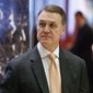 Sen. David Perdue, R-Ga., walks to the elevator for a meeting with President-elect Donald Trump at Trump Tower, Friday, Dec. 2, 2016, in New York. (AP Photo/Evan Vucci) ** FILE **