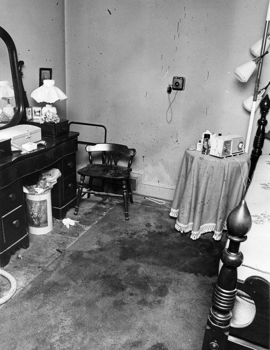 DVANCE FOR USE SUNDAY, DEC. 4 - This July 29, 1969, photo, shows the bedroom of a home where Elizabeth H. Grant where her body was found in Winston-Salem, N.C. Grant was stabbed 54 times, fighting her way through four rooms of the house. It is the county's oldest unsolved homicide. (Jim Keith /Winston-Salem Journal via AP)