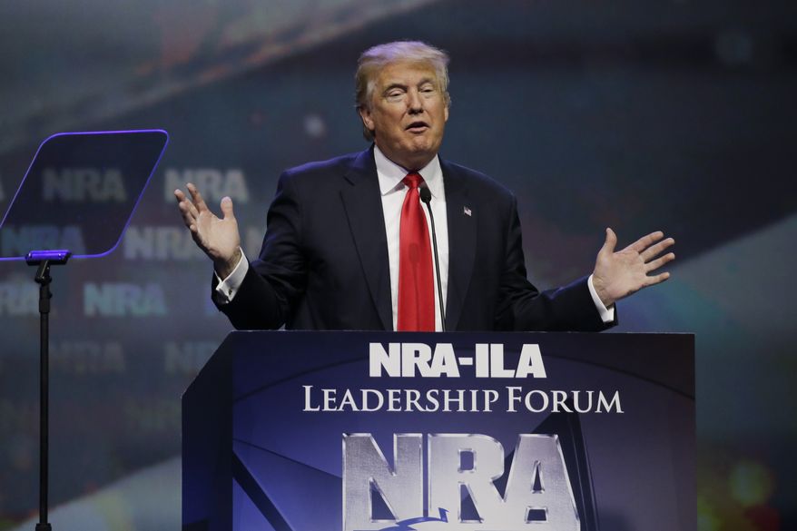 In this May 20, 2016, photo, then-Republican presidential candidate Donald Trump speaks at the National Rifle Association convention in Louisville, Ky. (Associated Press) **FILE**