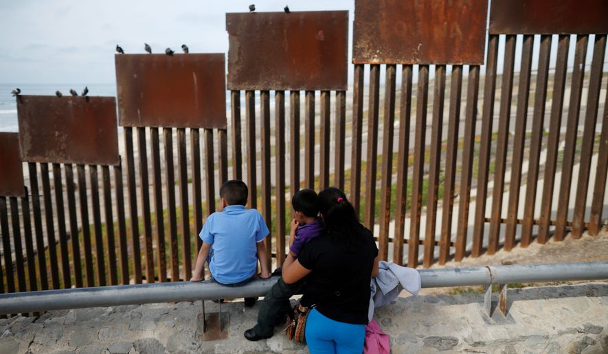 Many illegal immigrants crossing the Rio Grande are demanding U.S. asylum, claiming that fear of oppression back home has sent them north. These “magic words” whisk the migrants to asylum status. (Associated Press)