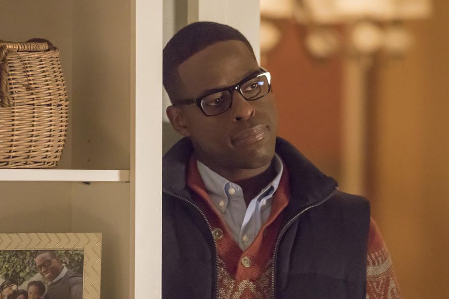 This image released by NBC shows Sterling K. Brown as Randall in a scene from the NBC series, "This Is Us." It’s safe to say Brown can chalk 2016 up as a win. He took home the Emmy for his portrayal of Christopher Darden in FX’s “The People v O.J. Simpson,” and is one of the stars of one of the rare success stories on primetime TV this fall, NBC’s ‘This is Us.’ (Ron Batzdorff/NBC via AP)
