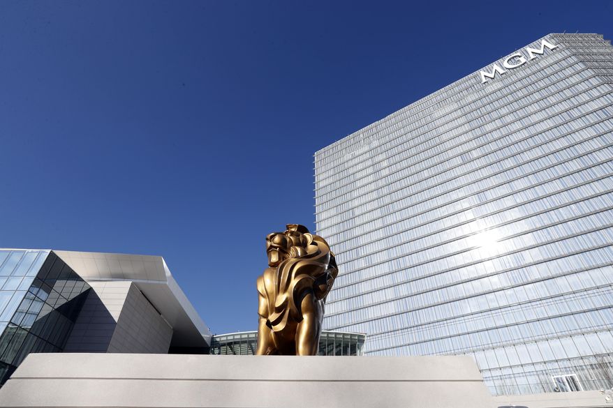 The MGM lion is seen in front of the 23-story hotel during a preview tour of the MGM National Harbor, Friday, Dec. 2, 2016 in Oxon Hill, Md. The $1.4 billion National Harbor casino and resort, just outside the nation's capital, is scheduled to open this week. (AP Photo/Alex Brandon)