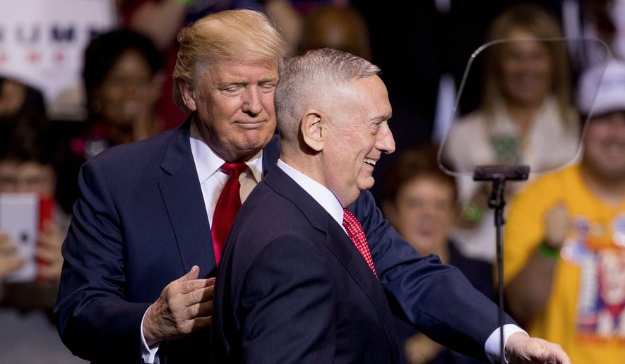 Defense secretary nominee James N. Mattis (right) disagrees with Donald Trump&#39;s view of Vladimir Putin, calling the Russian &quot;delusional.&quot; (Associated Press)