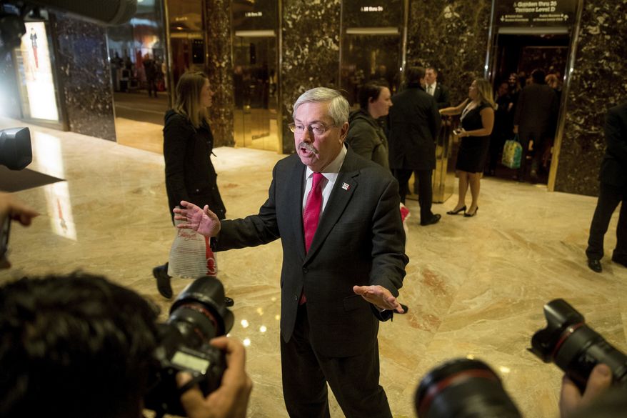 Iowa Gov. Terry Branstad speaks to members of the media in the lobby of Trump Tower in New York, Tuesday, Dec. 6, 2016. (AP Photo/Andrew Harnik)